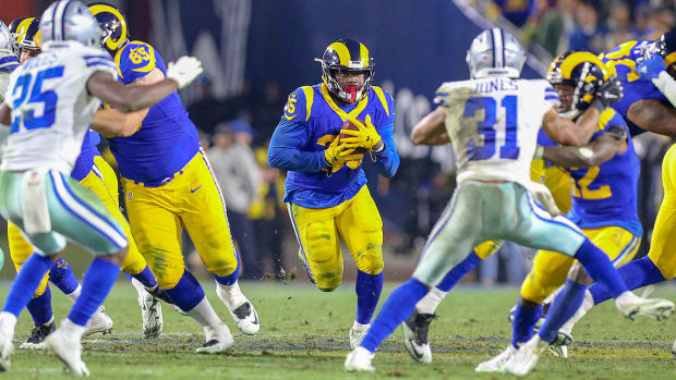 cj-anderson-rams-offensive-line.jpg